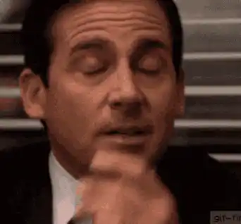 Man Rubbing Eyes with Headache
