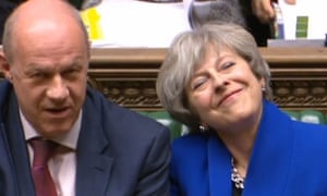 The prime minister smiles as she sits alongside Damian Green who she sacked as first secretary of state.